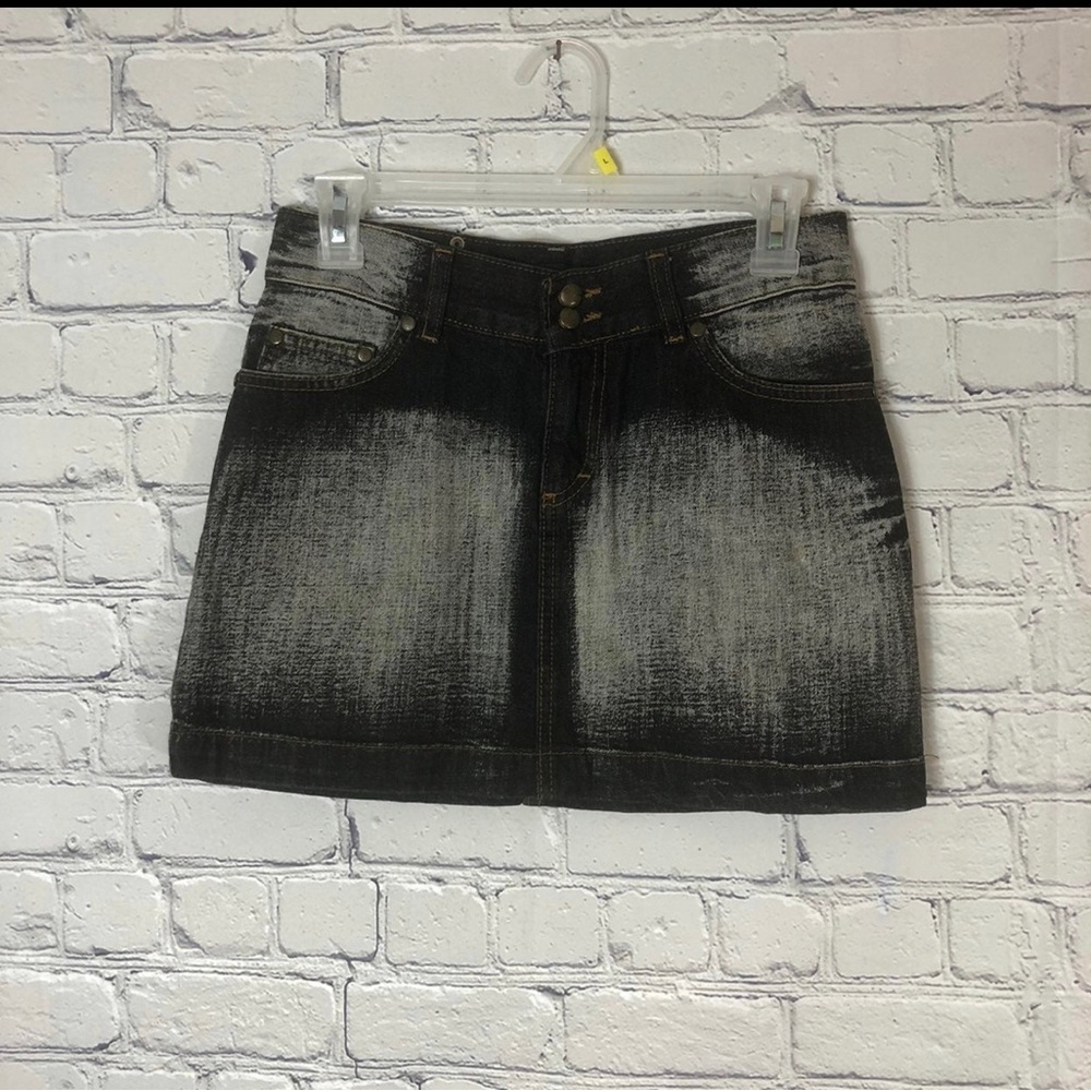 Dolce and Gabbana denim mini skirt.